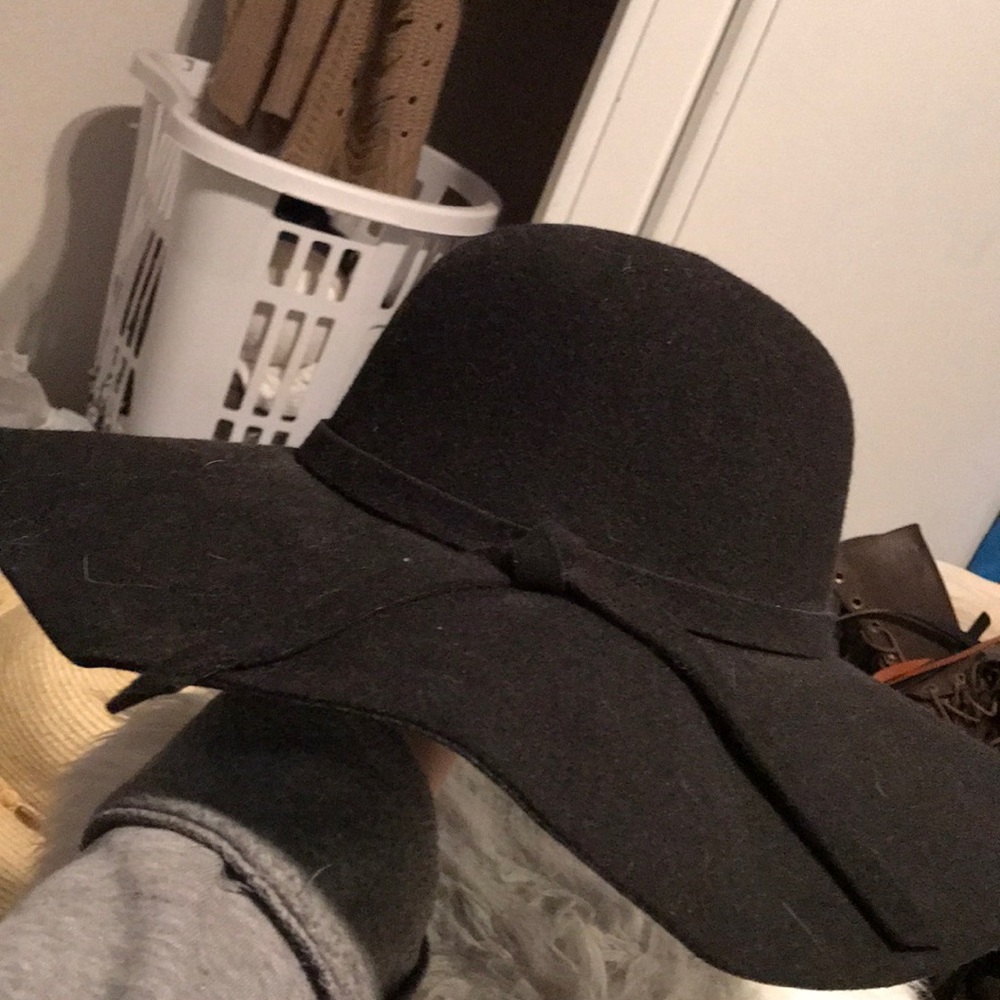 Black floppy hat. Never worn before.